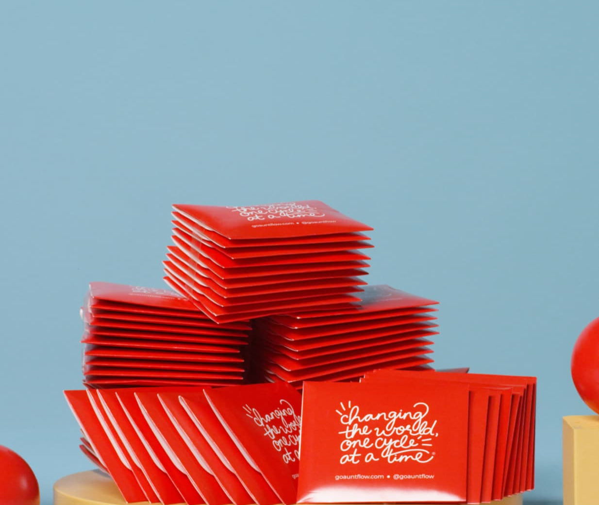 Stack of red packets with text on a blue background